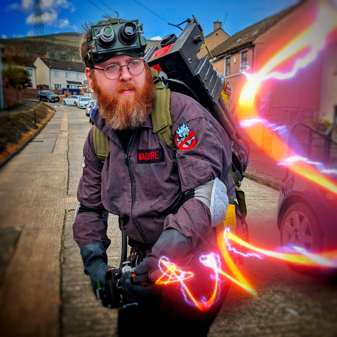 Ciaran in a Ghostbuster-inspired uniform with a proton pack